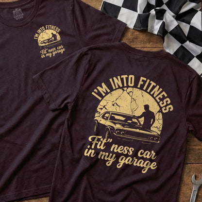 T-shirt with "I'M INTO FITNESS Fit' ness car in my garage" text and car graphic.