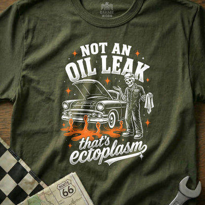 Skeleton mechanic next to a car with "NOT AN OIL LEAK that's ectoplasm" text.