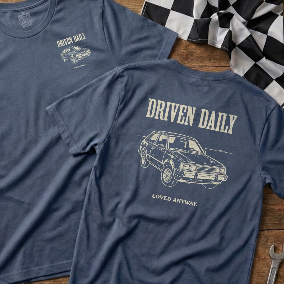 T-shirts with "DRIVEN DAILY" and a car graphic, one front, one back.