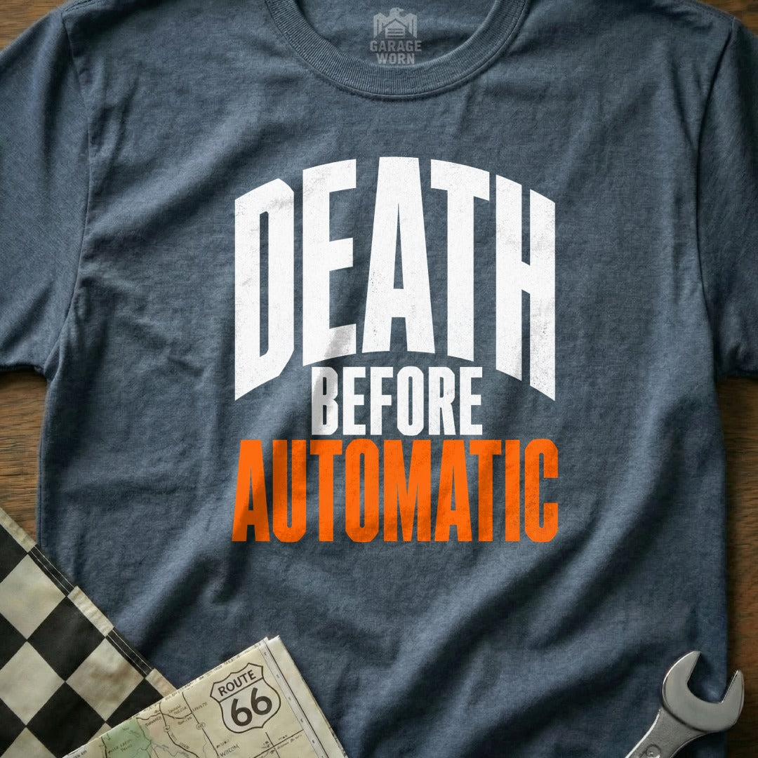 T-shirt with white text "DEATH BEFORE AUTOMATIC" and "GARAGE WORN" logo.