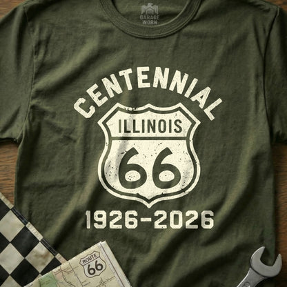Centennial Illinois Route 66 1926-2026 shield logo on olive green t-shirt.