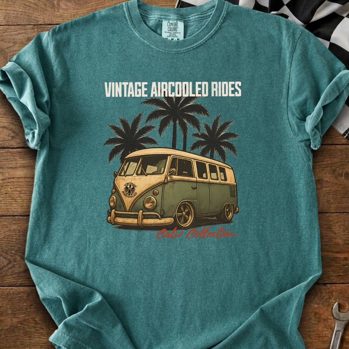 Teal t-shirt with vintage bus, palm trees, and "Vintage Aircooled Rides" text.