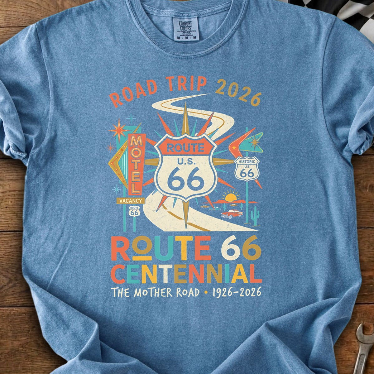 Route 66 Centennial 2026 road trip t-shirt with motel and vintage car graphics.