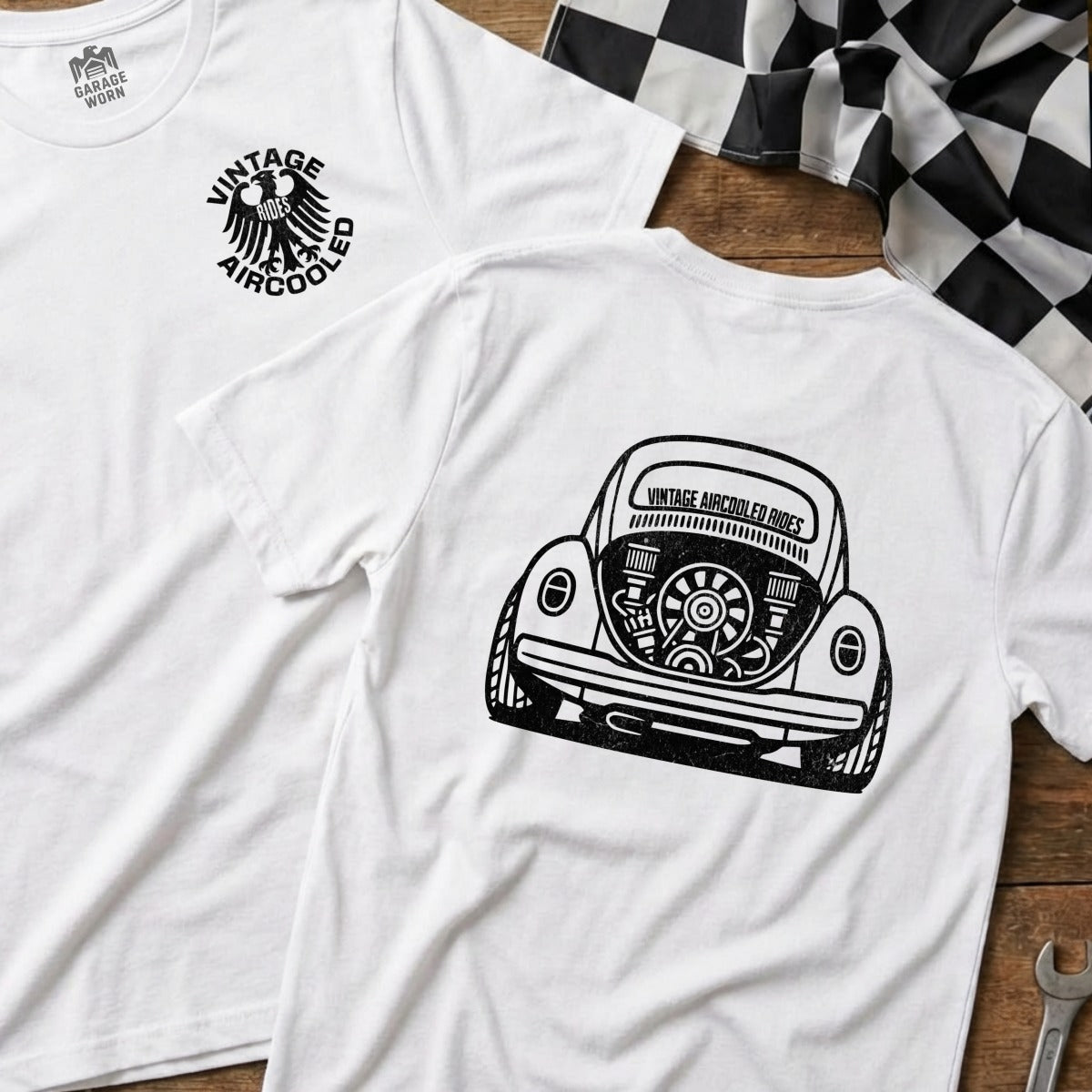White t-shirt with black graphic of a vintage Volkswagen Beetle engine on back.