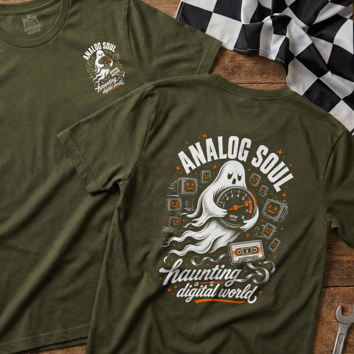 Green t-shirt with ghost holding speedometer, cassette, and screens with text Analog Soul.