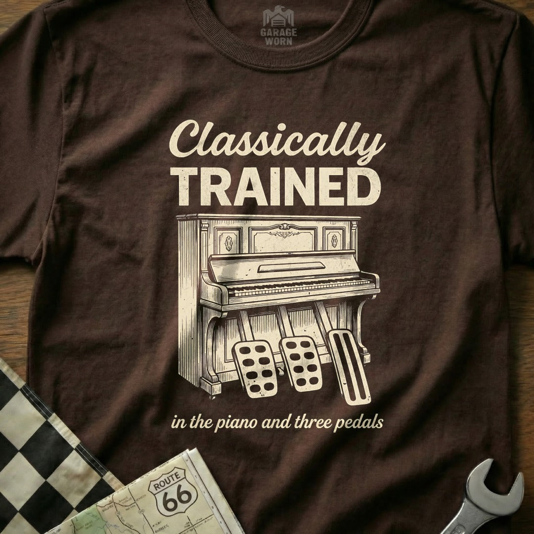 Brown t-shirt with "Classically Trained" and a piano with three pedals.