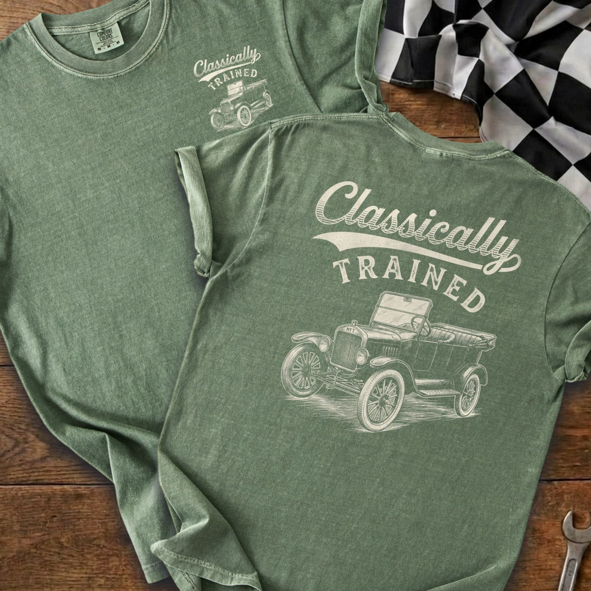 Green t-shirt with cream graphic of "Classically Trained" text and vintage car.