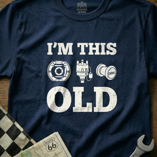 Navy t-shirt with "I'm this old" and illustrations of car parts.