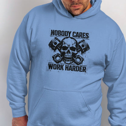 Light blue hooded sweatshirt with black graphic of skull, pistons, and text.
