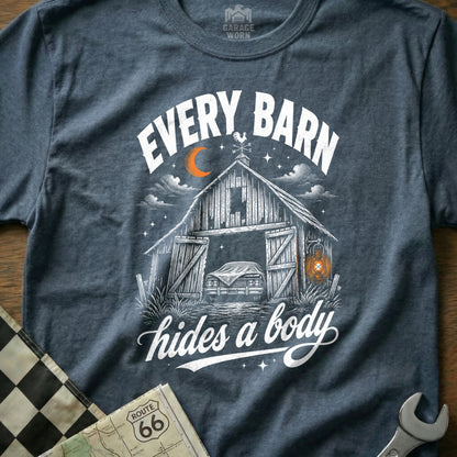 T-shirt with a graphic of a barn at night with a car inside and text "EVERY BARN hides a body".