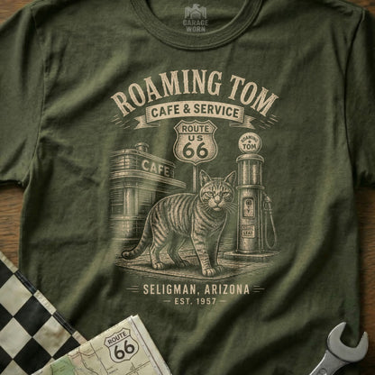 T-shirt graphic with a cat, Route 66 sign, cafe, and gas pump.