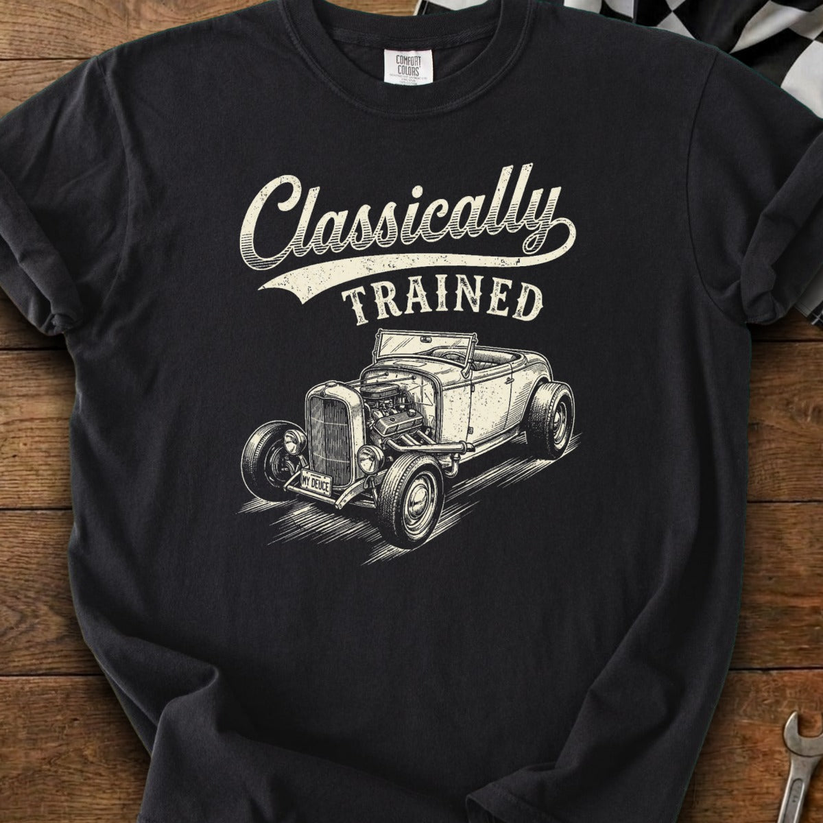 Black t-shirt with a vintage hot rod and text "Classically TRAINED".