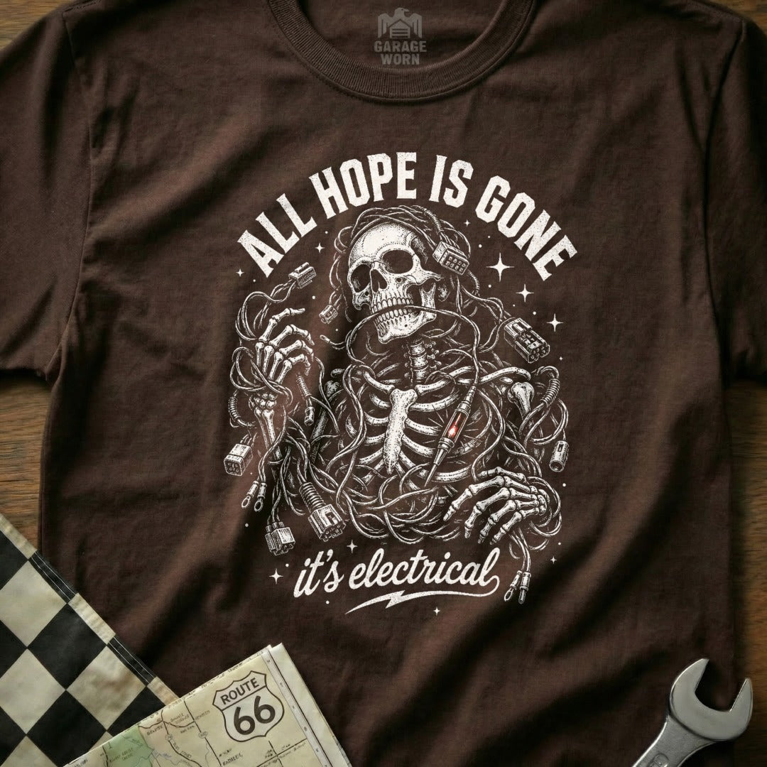 Brown t-shirt with skeleton entangled in wires, text "ALL HOPE IS GONE it's electrical".