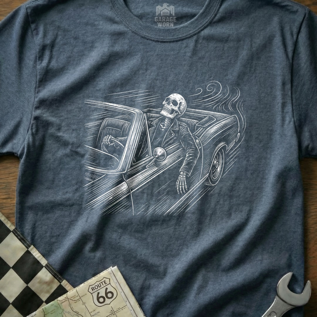 Skeleton driving a classic convertible on a dark blue t-shirt.