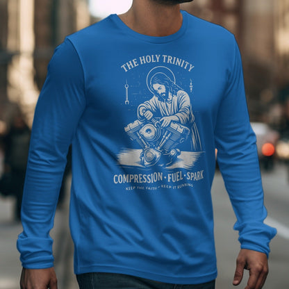 Blue long sleeve shirt with graphic of Jesus working on motorcycle engine.