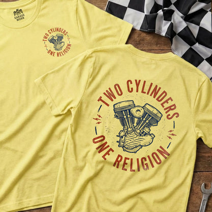 Yellow t-shirt with red text and graphic of a V-twin engine.