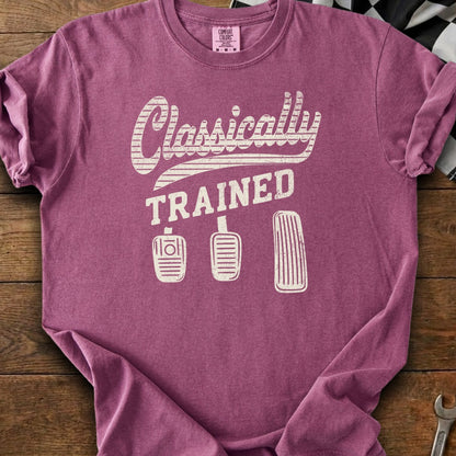 T-shirt with "Classically TRAINED" text and three car pedals.