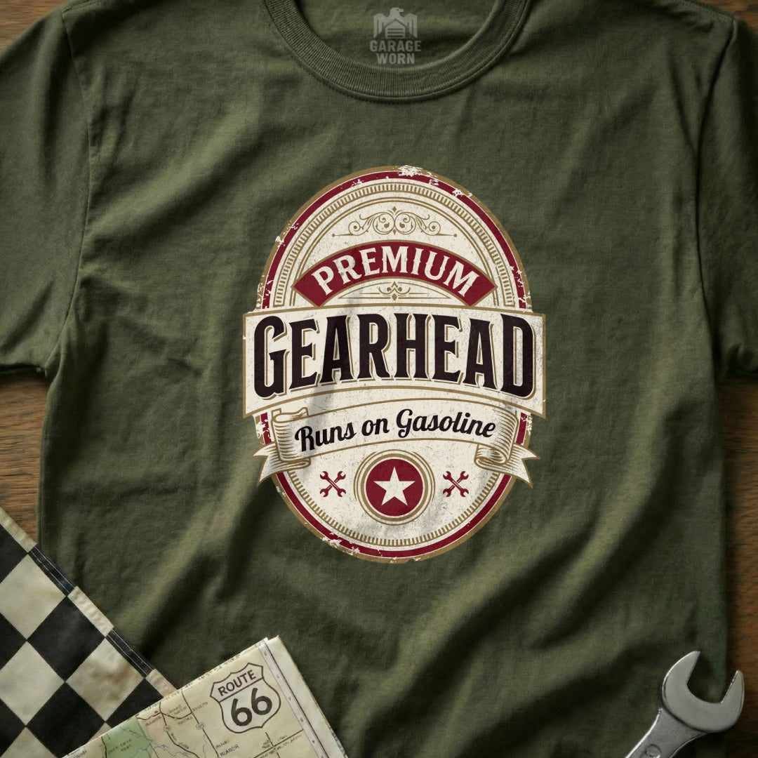 Olive green t-shirt with oval "Gearhead Runs on Gasoline" logo.