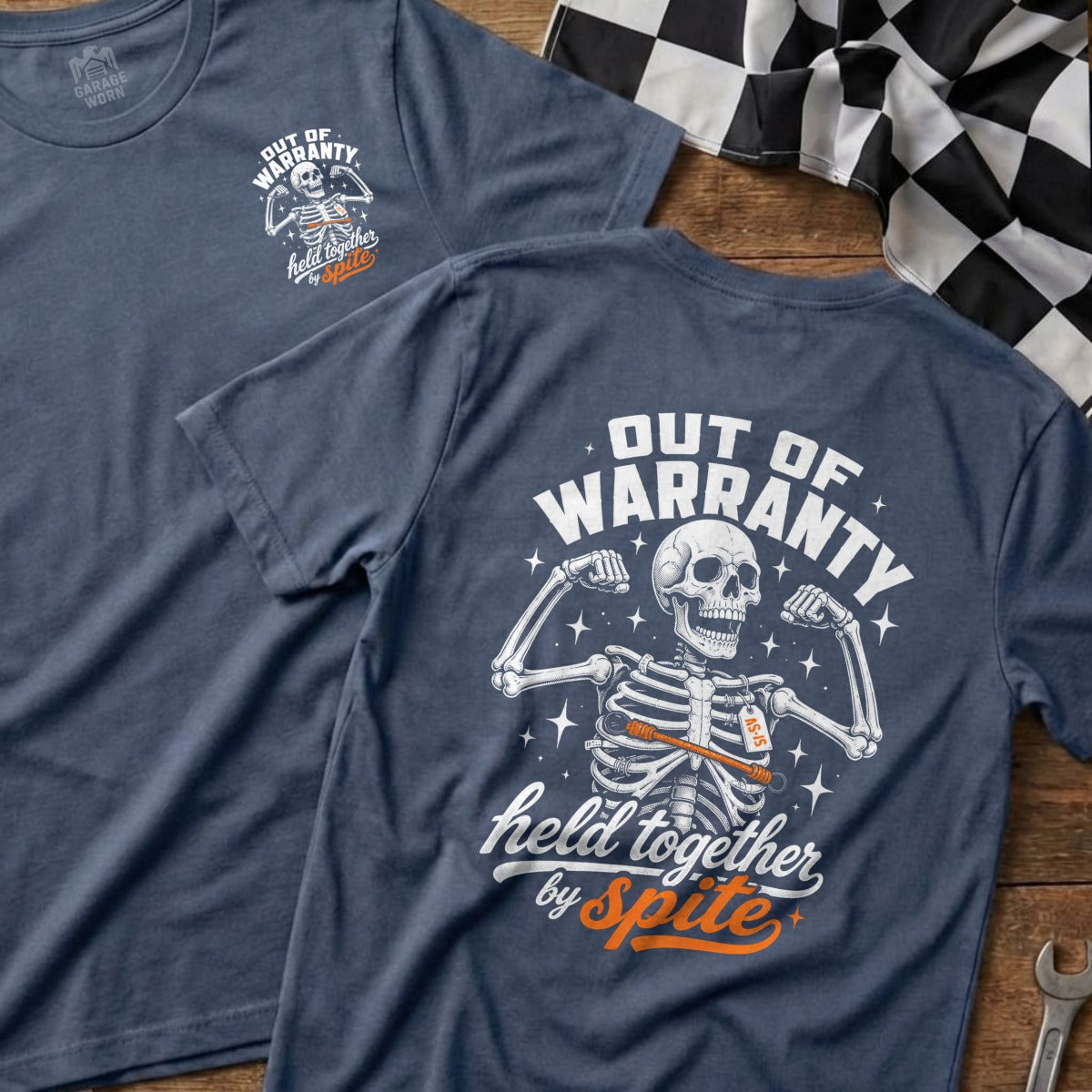 T-shirt with skeleton graphic and "Out of Warranty Held Together by Spite" text.