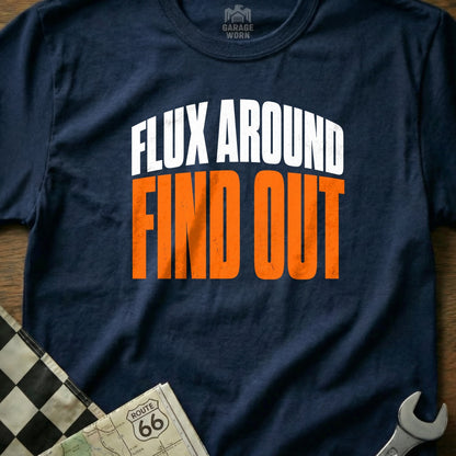 Navy t-shirt with white and orange text "FLUX AROUND FIND OUT".