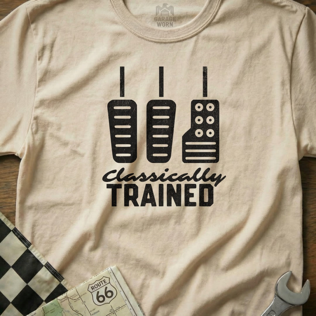 Cream t-shirt with black graphic of three pedals and "CLASSICALLY TRAINED" text.