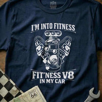 Navy t-shirt with "I'm Into Fitness, Fit'ness V8 In My Car" text and engine graphic.