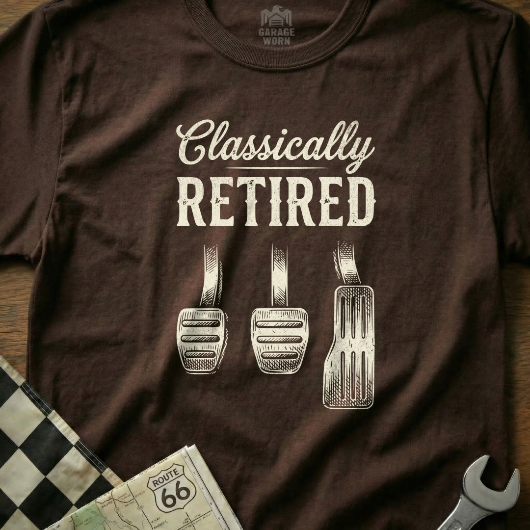 Brown t-shirt with "Classically Retired" and three car pedals.