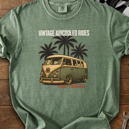 Green t-shirt with vintage van, palm trees, and text "Vintage Aircooled Rides Cali Collection".