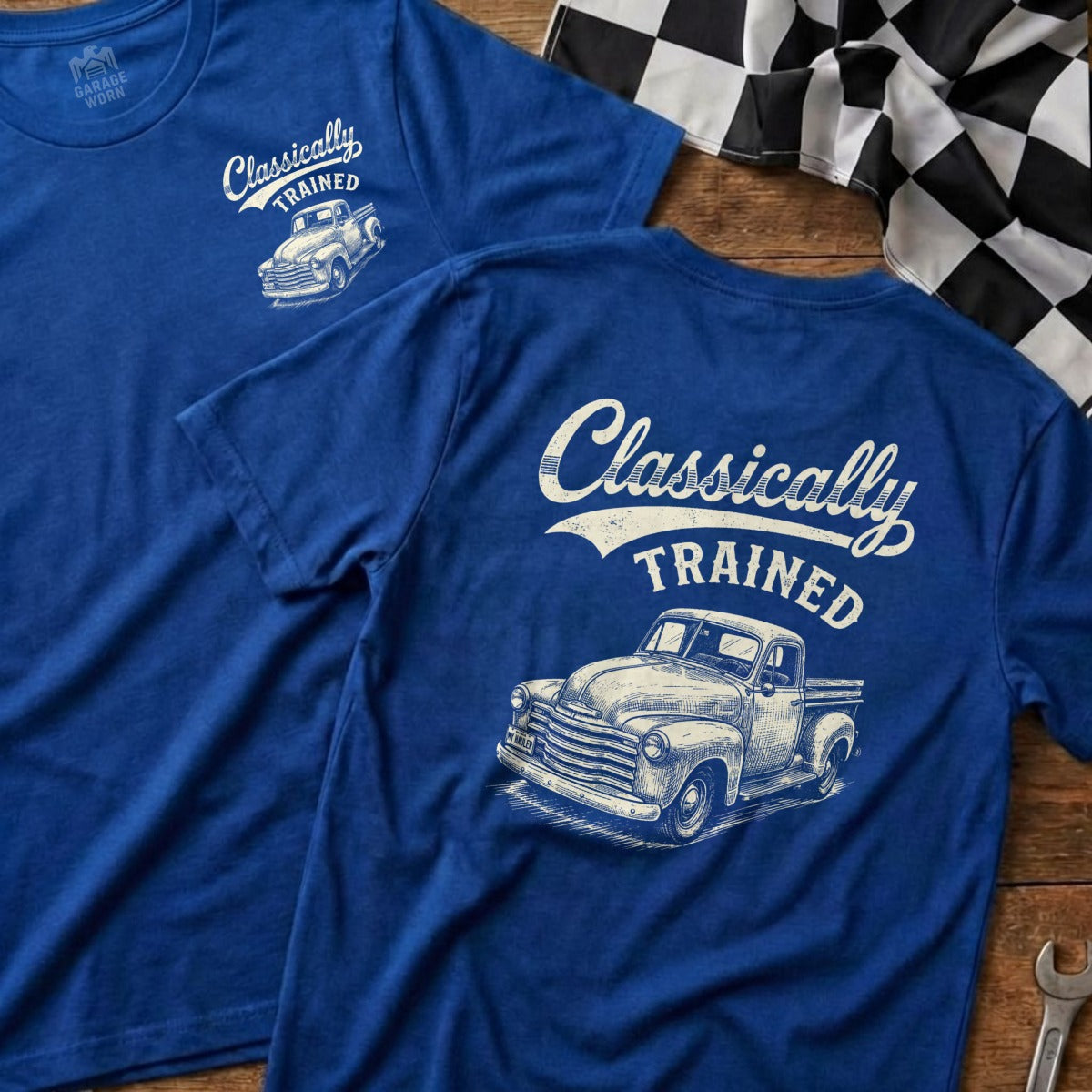 Blue t-shirt with white text "Classically TRAINED" and vintage truck graphic.