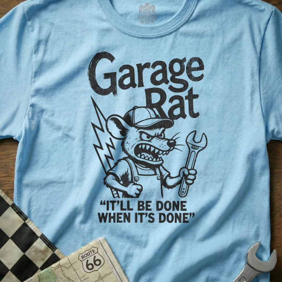 Light blue t-shirt with "Garage Rat" and a cartoon rat holding a wrench.