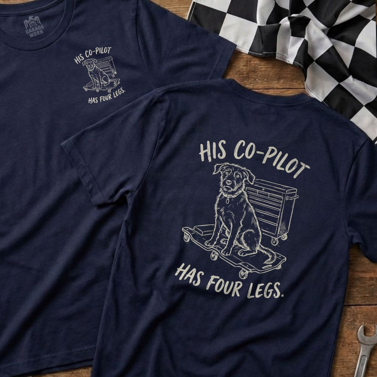 Navy t-shirt with a dog on a skateboard and text "His Co-Pilot Has Four Legs."