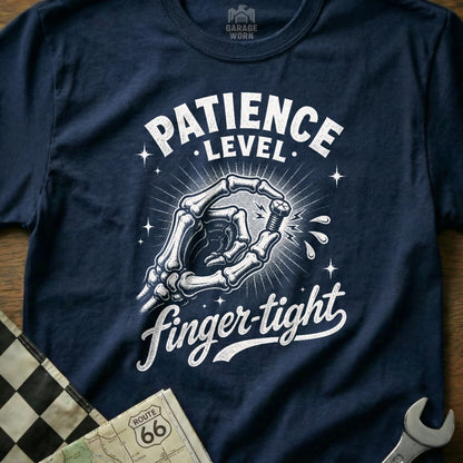 Navy t-shirt with skeleton hand text "Patience Level Finger-tight".