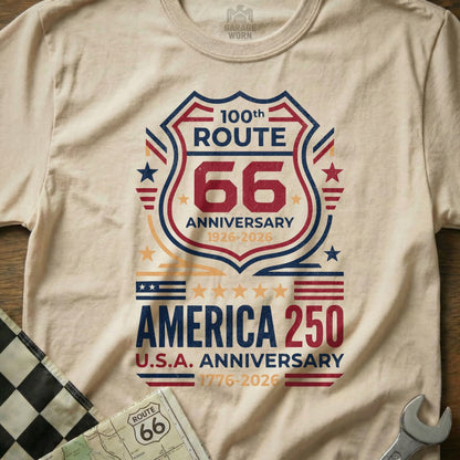 Route 66 and America 250 anniversary shield graphic on a cream t-shirt.