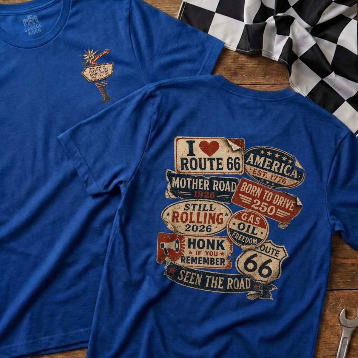 Blue t-shirts with Route 66 designs, one featuring a marquee and the other a collage of slogans.