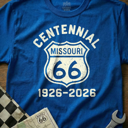 Blue t-shirt with "Centennial Missouri 66 1926-2026" in distressed white lettering.
