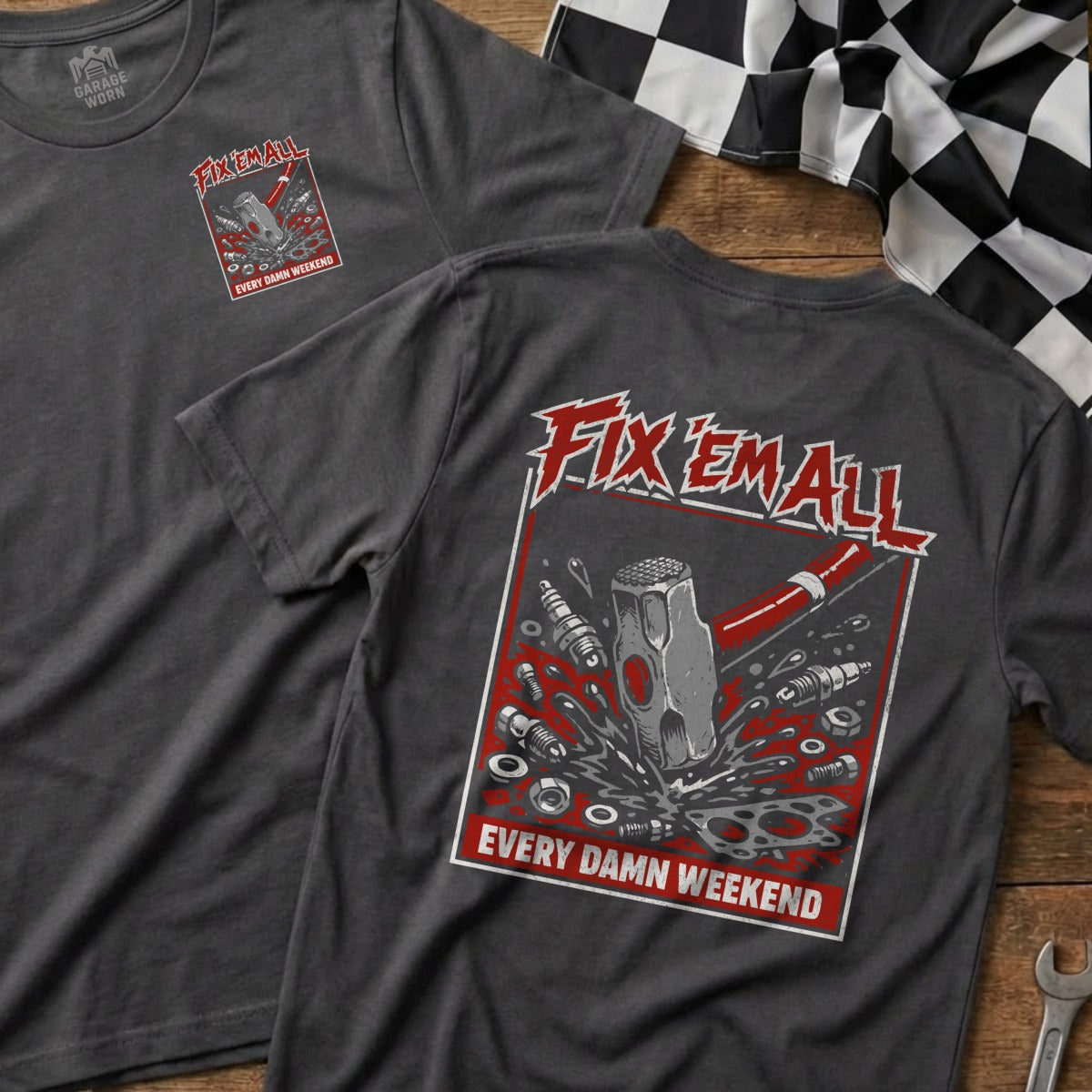 Garage Grown Fix Em All t-shirt with hammer, gears, and checkered flag graphic.
