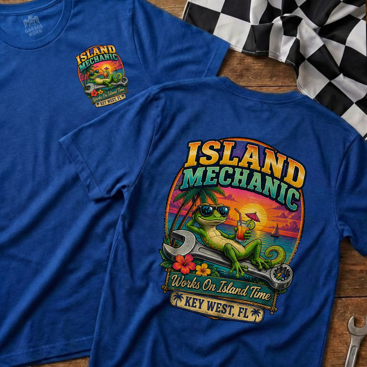 Blue t-shirt with "Island Mechanic" graphic featuring a gecko on a wrench with "Key West, FL" text.