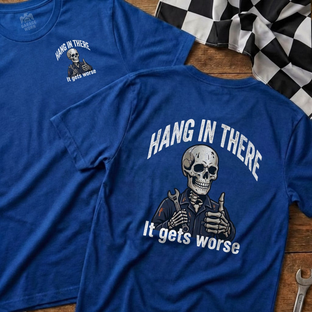 Blue t-shirt with skeleton giving thumbs up, "Hang in There It gets worse" text.