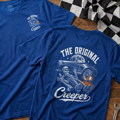 Blue t-shirt with a skeleton on a creeper and a car under a moon.