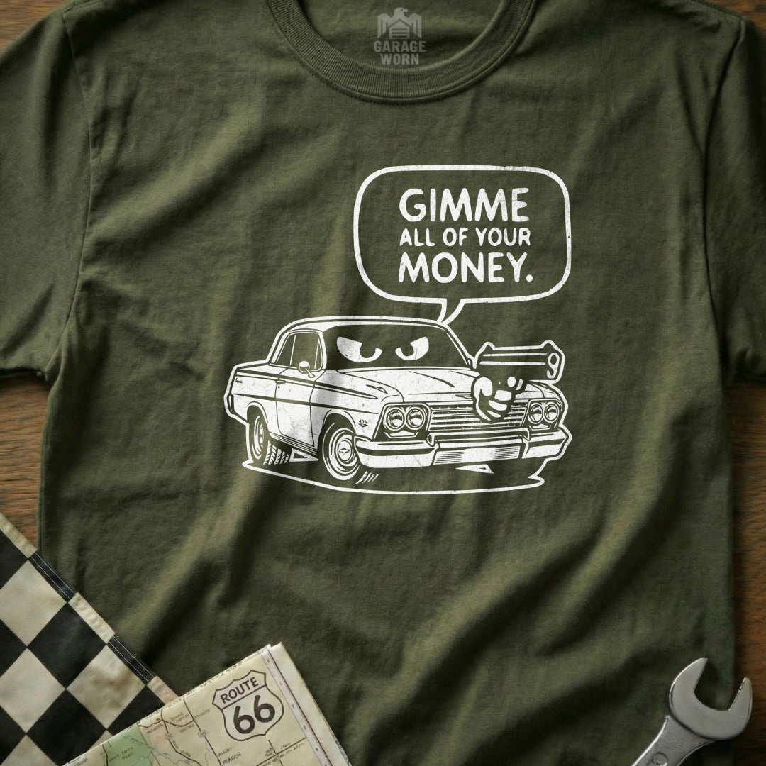 Olive green t-shirt with cartoon illustration of a vintage car and "Gimme all of your money." text.