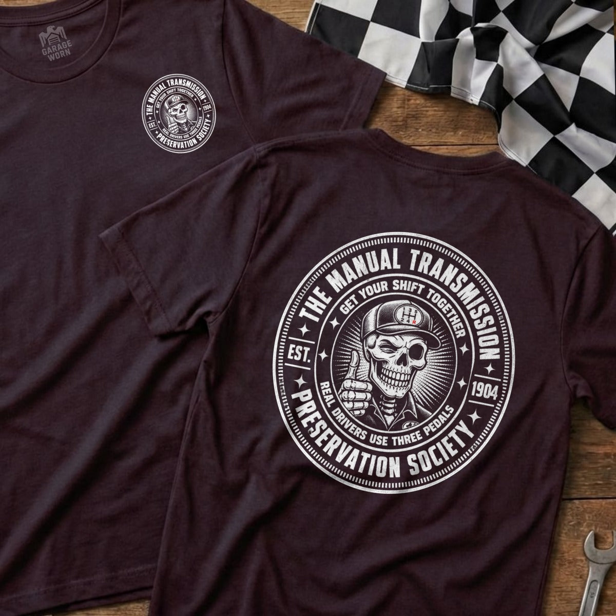 Maroon t-shirts with "Manual Transmission Preservation Society" text and skeleton graphic.