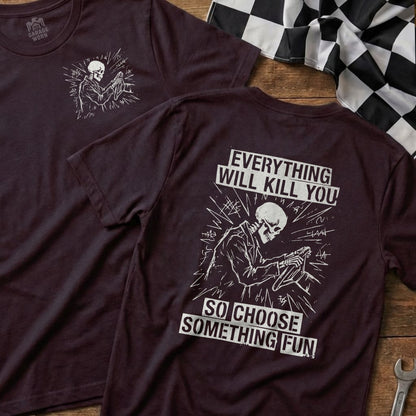 T-shirt with skeleton driving and text: "Everything Will Kill You. So Choose Something Fun."