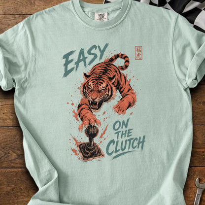 Tiger lunging for a manual transmission stick shift with text.