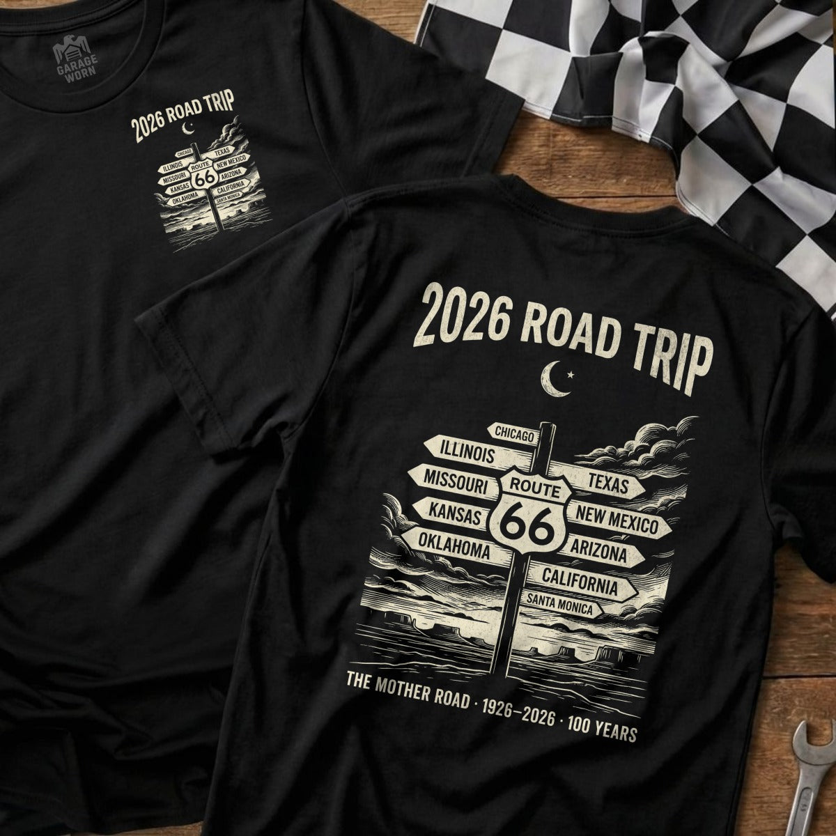 Black t-shirt with "2026 Road Trip" and Route 66 destination sign.