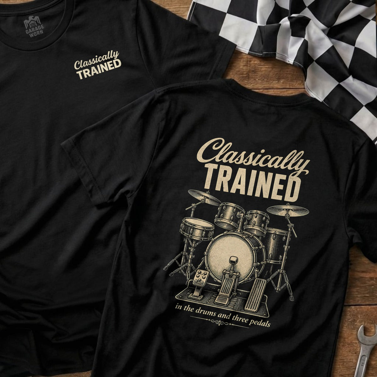 Black t-shirt with "Classically Trained" and drum set graphic.