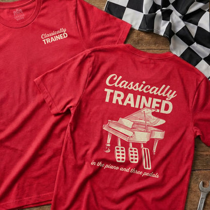 Red t-shirt with "Classically Trained" and piano with three pedals.