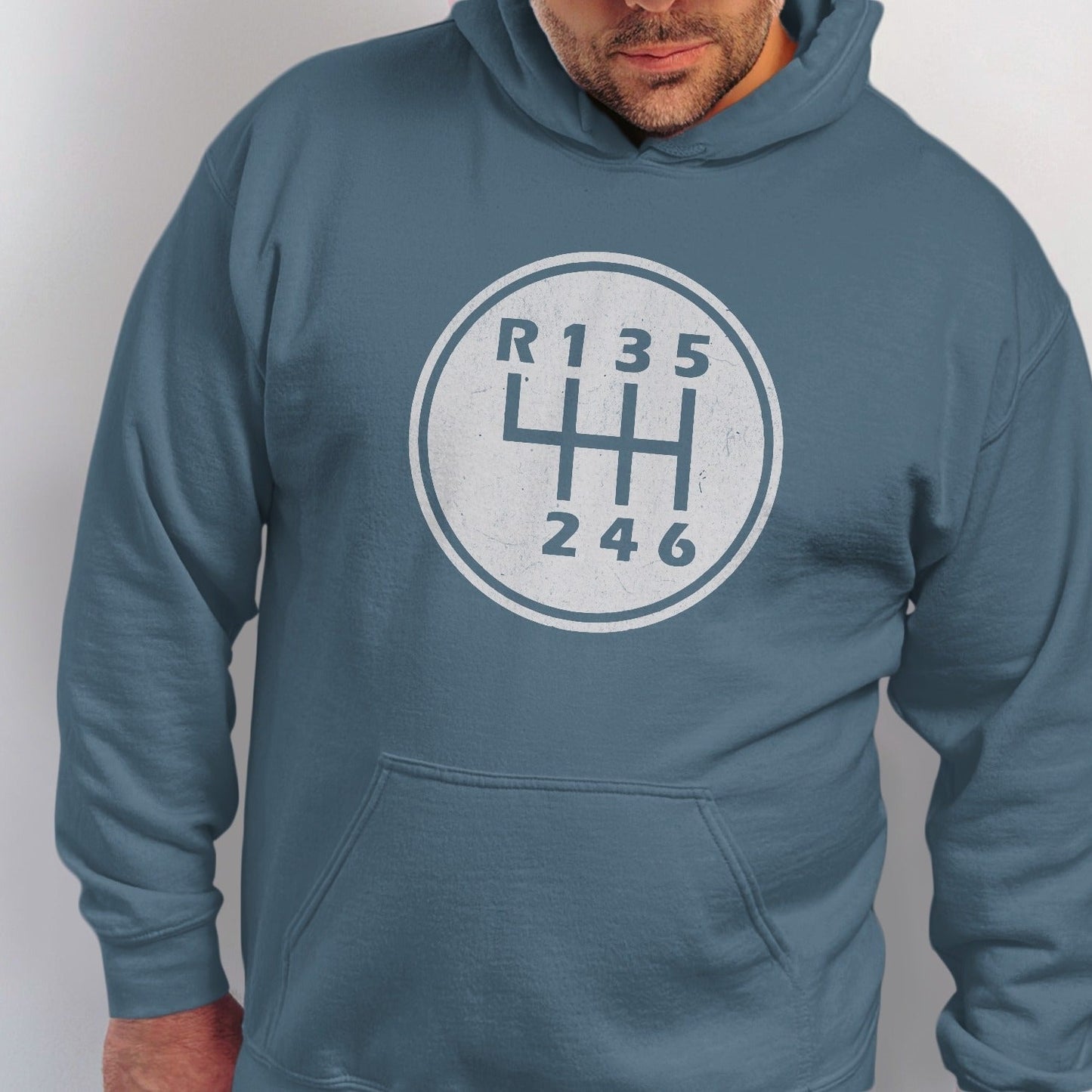 Blue hoodie with a white manual gear shift pattern design.