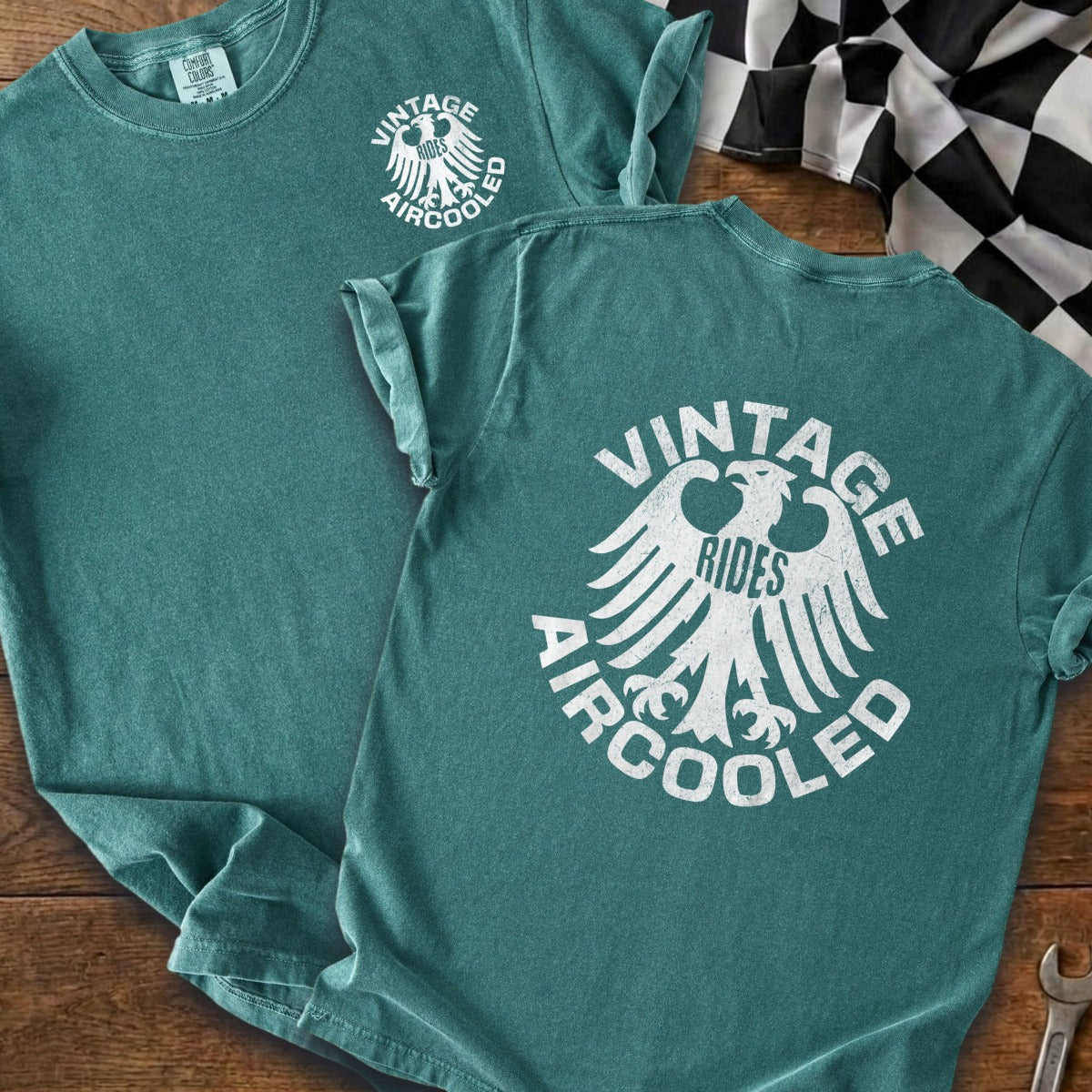 Teal t-shirts with "Vintage Rides Aircooled" eagle graphic and checkered flag.