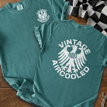 Teal t-shirts with "Vintage Rides Aircooled" eagle graphic and checkered flag.