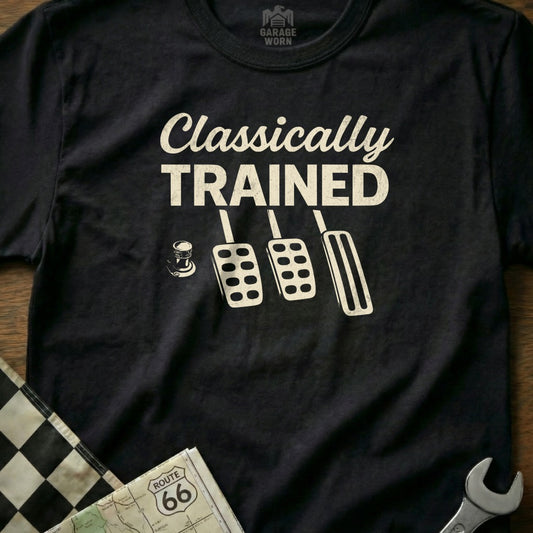Black t-shirt with "Classically Trained" and car pedal graphic.